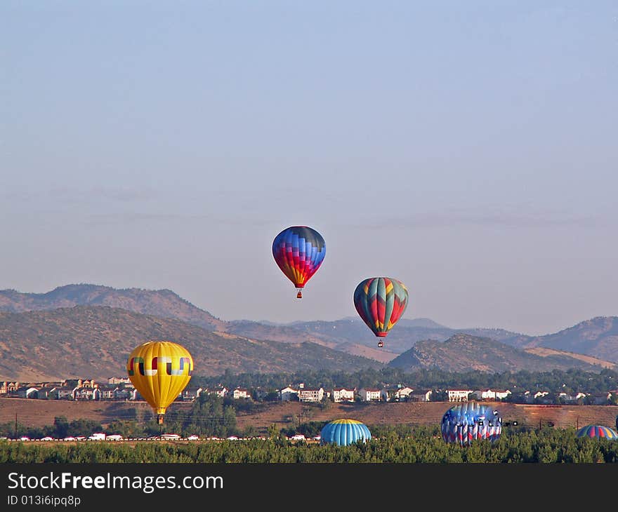 Hot air balloons ascending into air. Hot air balloons ascending into air