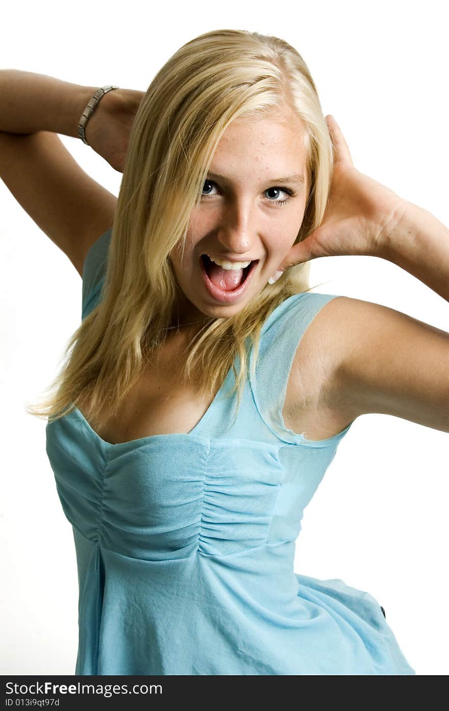 Surprised young beautifull teenage girl isolated on a white background