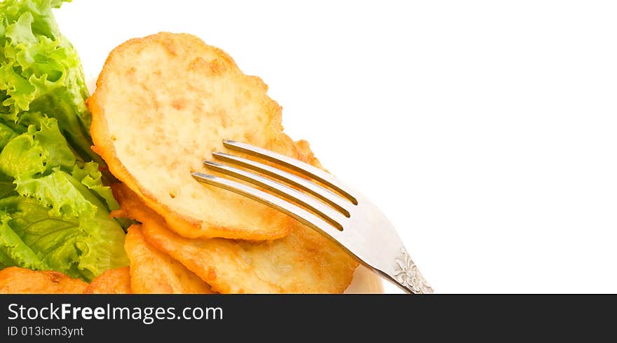 Potato pancakes and green salad