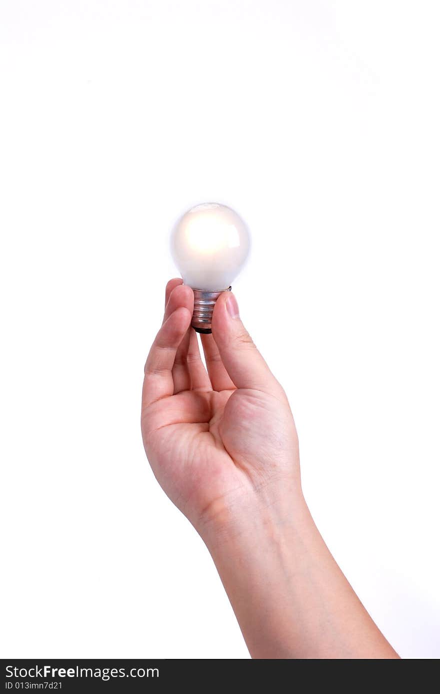 Light bulb in hand, isolated on white background