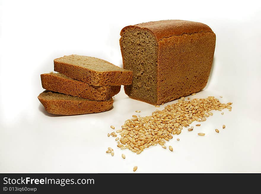 Bread and grain on a white background large. Bread and grain on a white background large