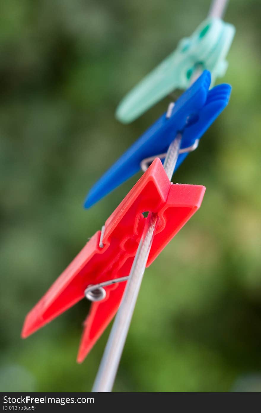 Laundry stave plastic colored clothespin