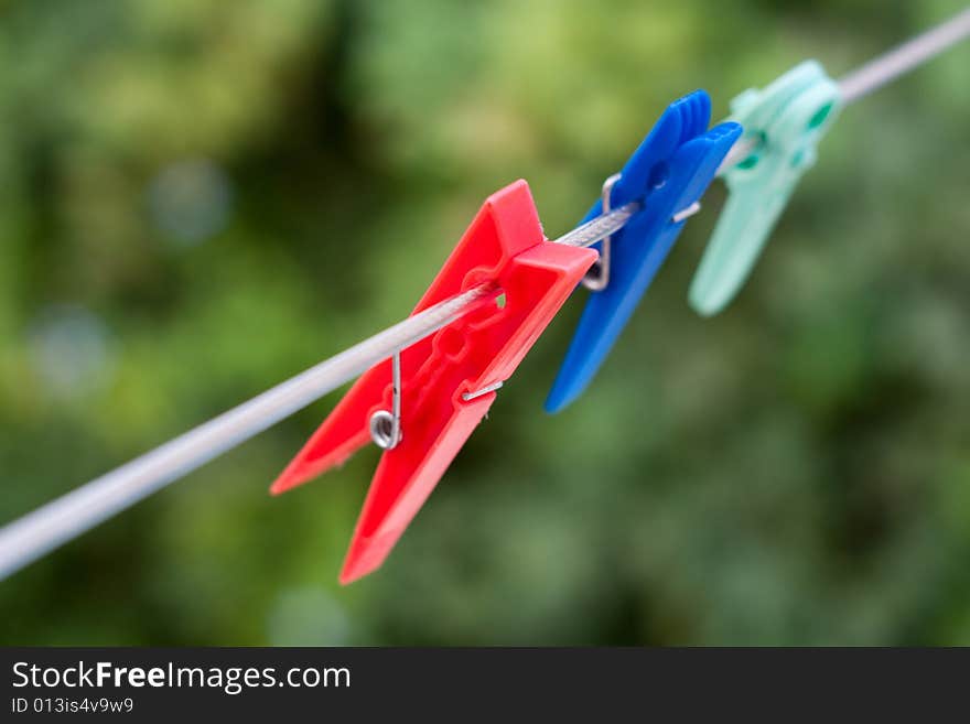 Laundry stave plastic colored clothespin