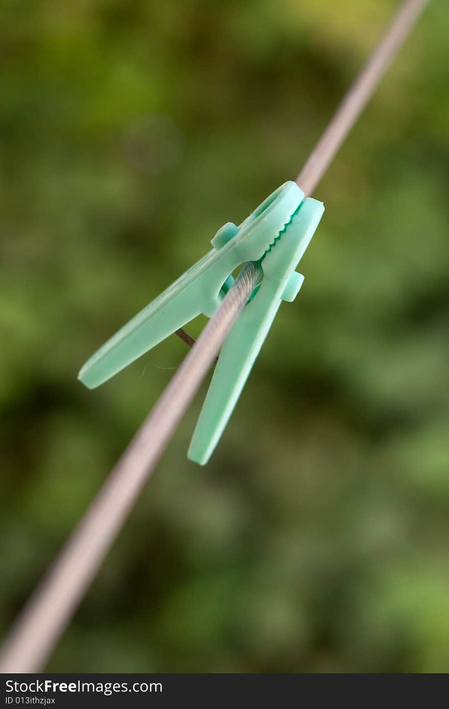 Laundry stave plastic colored clothespin