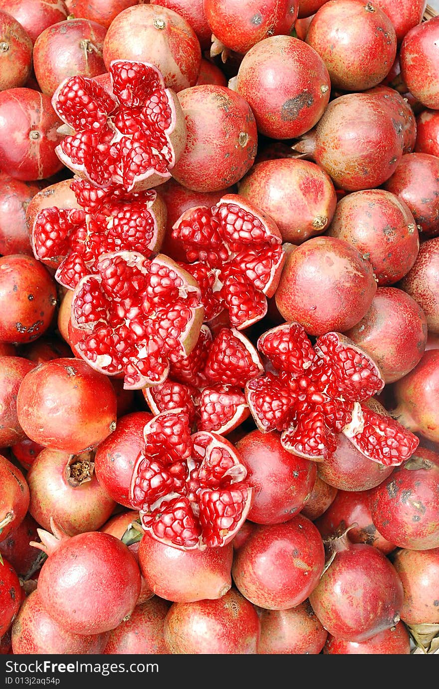 Group of pomegranates in market