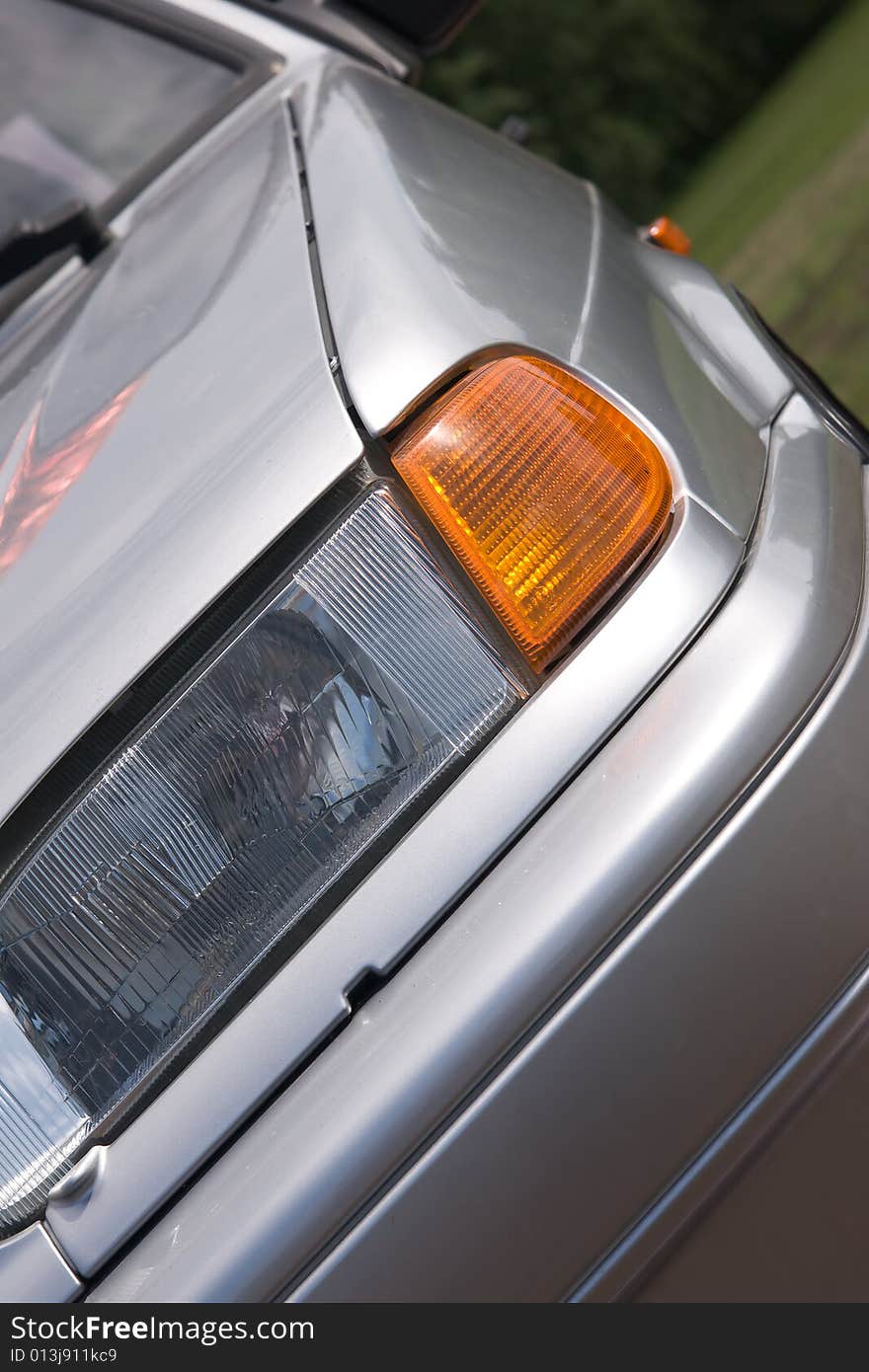 View from front side, headlamp and bumper. View from front side, headlamp and bumper