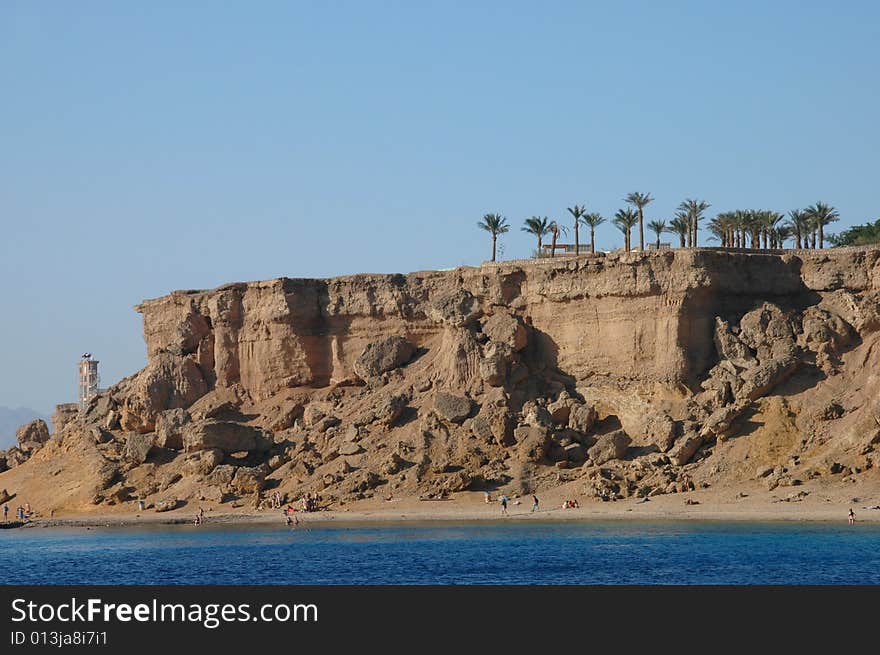 Sea desert beach, a clear sky. Sea desert beach, a clear sky