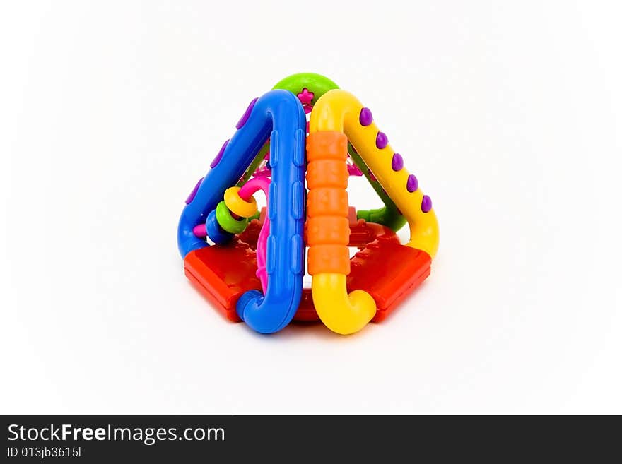 Colored plastic baby toy on a white background