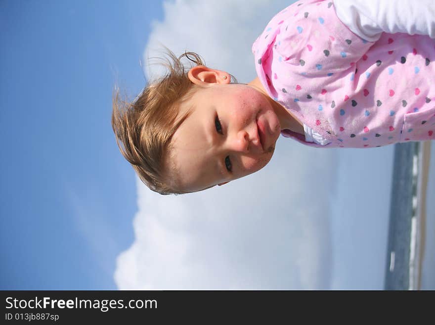 Little girl aged 18 months on the beach exploring the big new world. Little girl aged 18 months on the beach exploring the big new world.