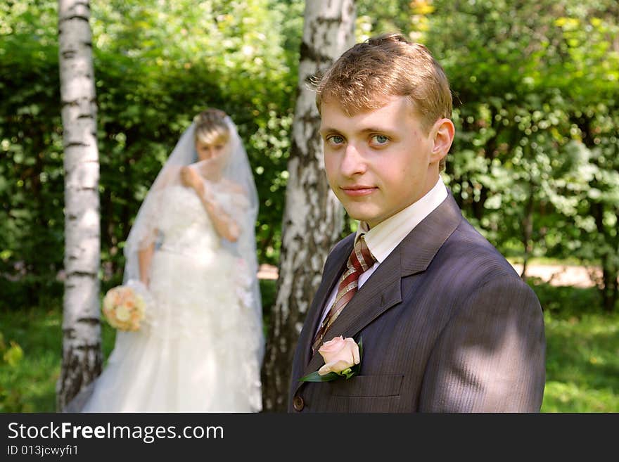 The groom and the bride during walk in park. The groom and the bride during walk in park