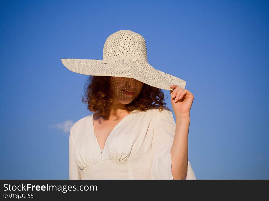 Girl dressed in hat