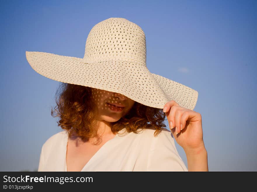 Girl dressed in hat