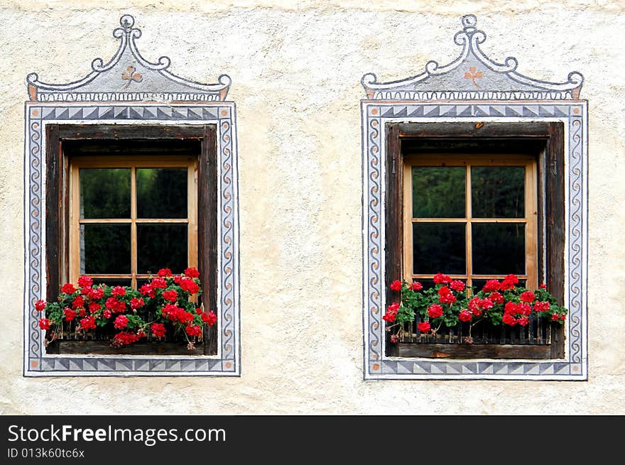 Windows on an antique house in Italy, detail. Windows on an antique house in Italy, detail