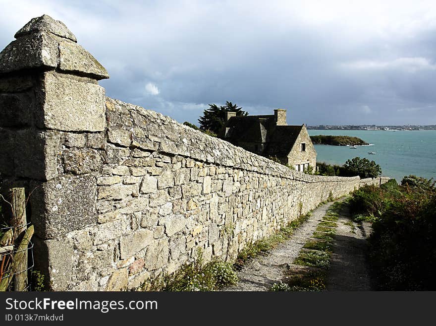 Wall and house on the countryside