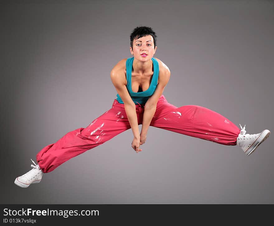 Dancing Woman In Sportswear  Jumps