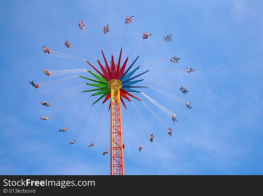 Carrousel in a blue sky. Carrousel in a blue sky