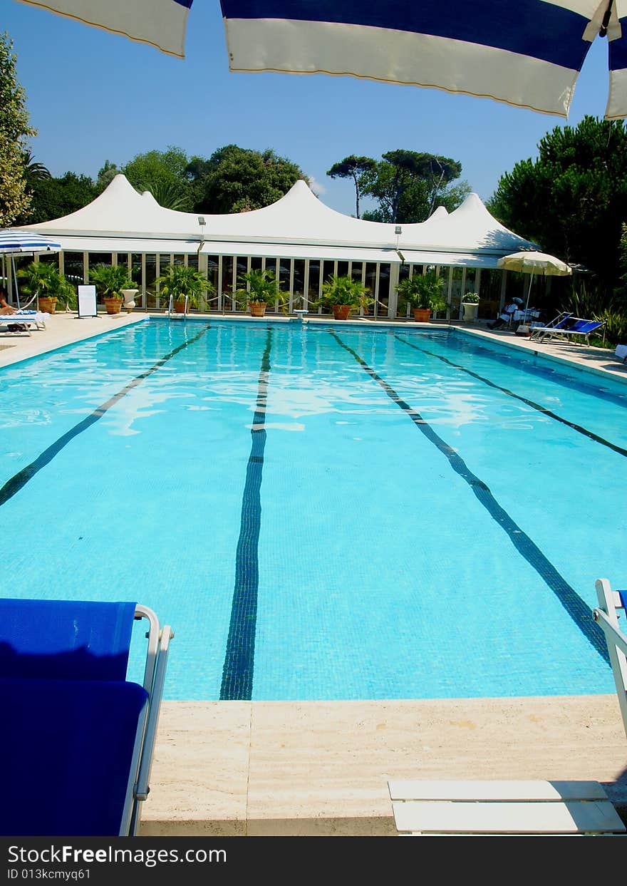 A wonderful shot of a pool in a hotel. A wonderful shot of a pool in a hotel