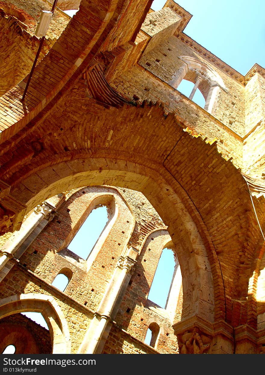 A suggestive shot of the uncover aisles of San Galgano abbey. A suggestive shot of the uncover aisles of San Galgano abbey