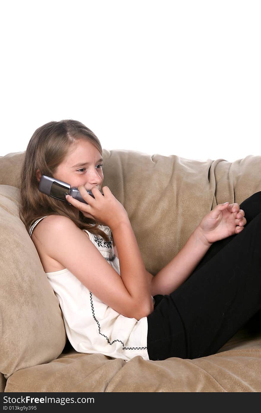 Girl on phone in chair