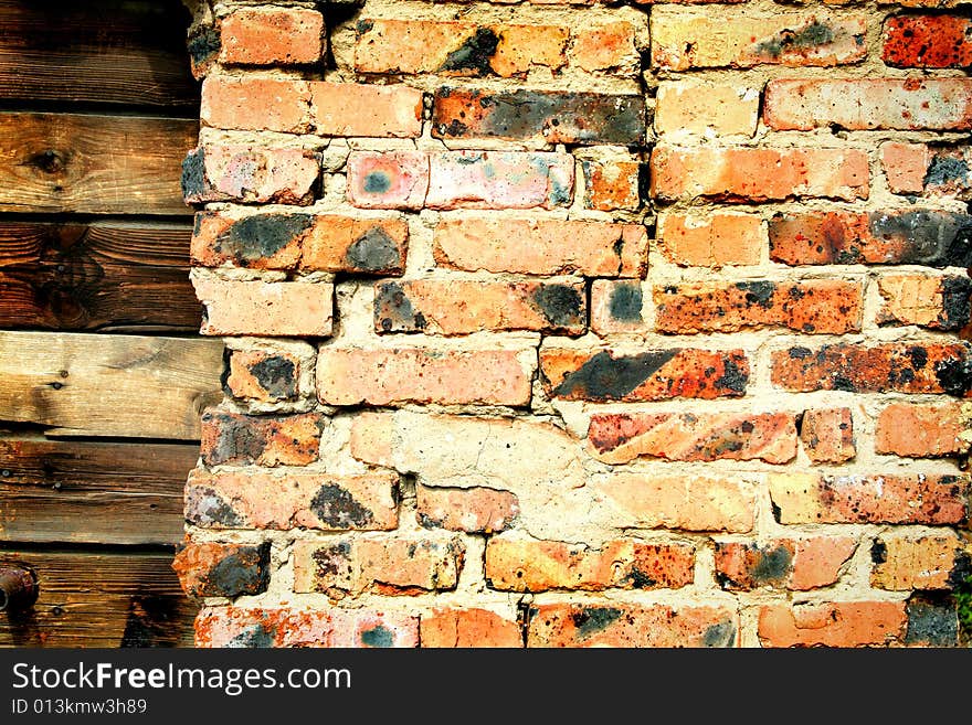 Grunge dark red brick and wood wall background texture