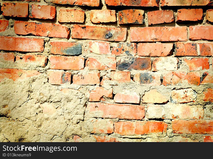 Roughly plastered brick wall, background