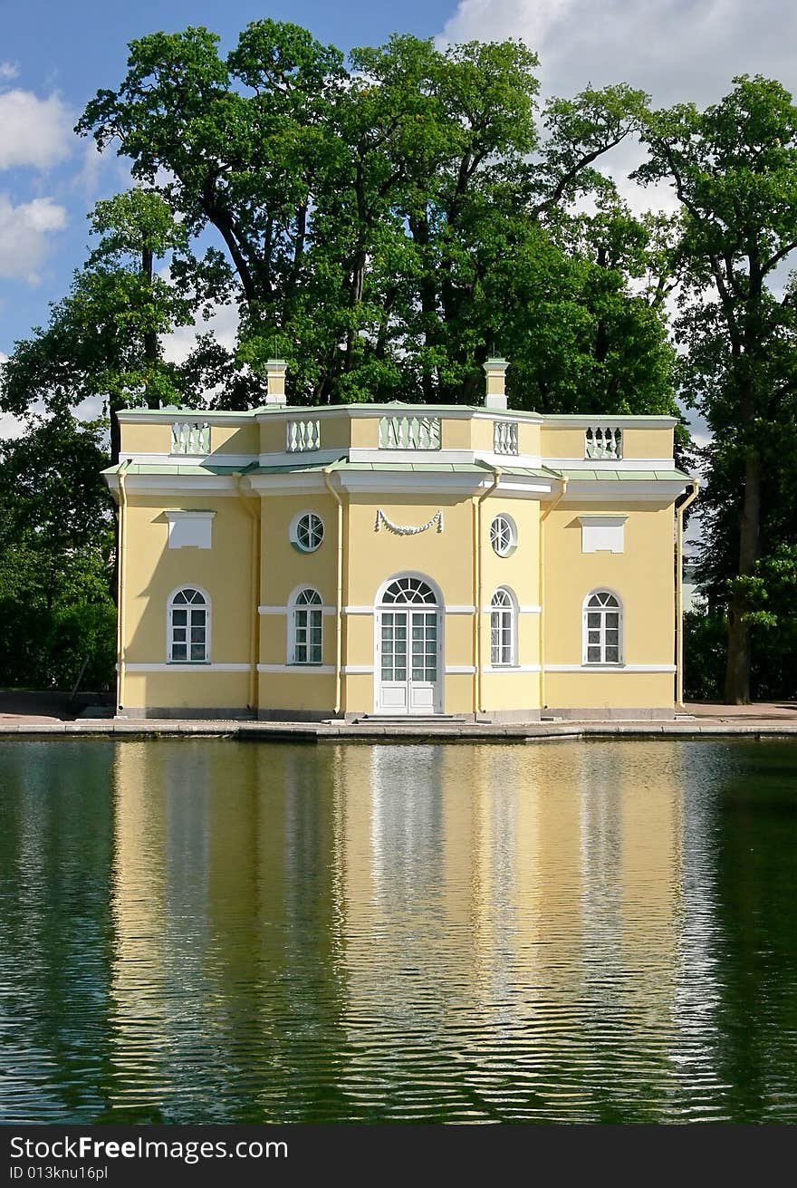 The house near pond. Reflex. The house near pond. Reflex.