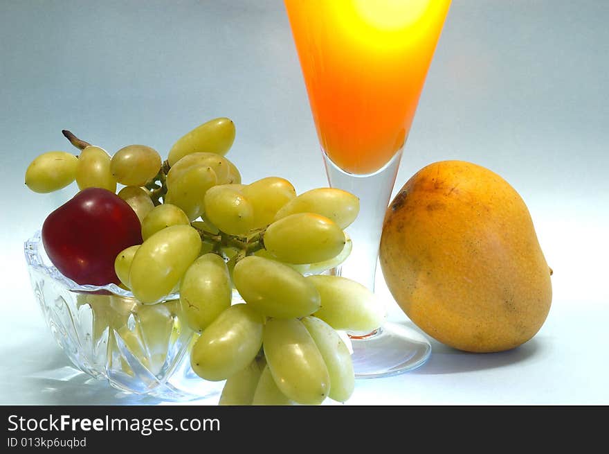 Still life with fruits & juice.