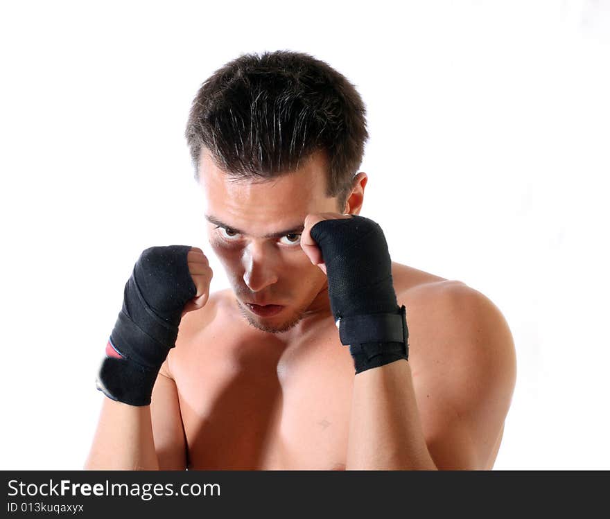 The young boxer on a white background .