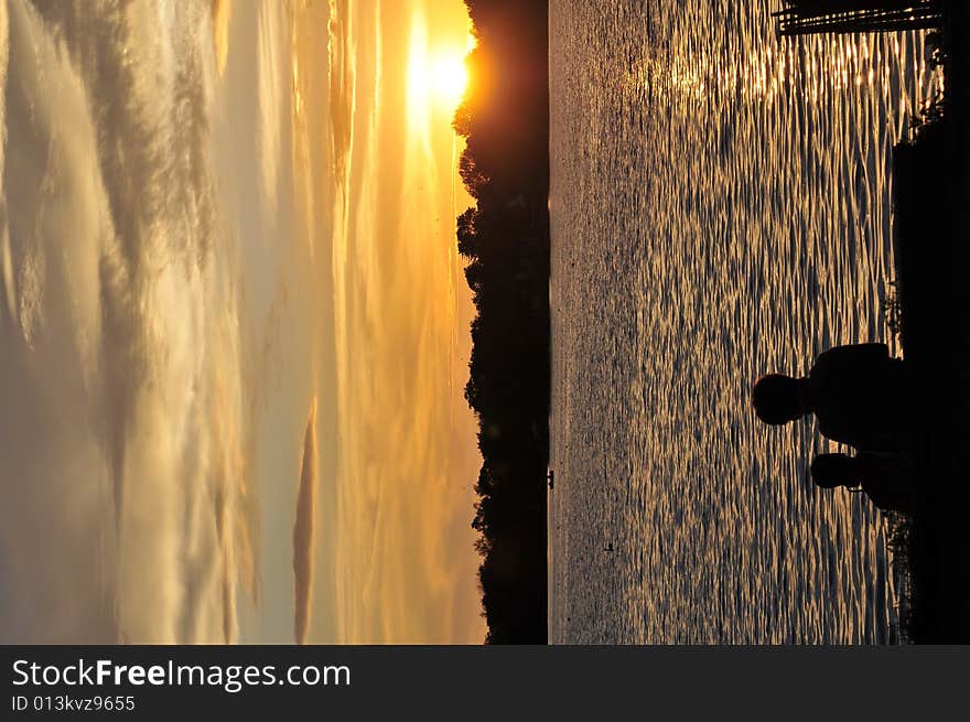 Son and mom watching SunSet