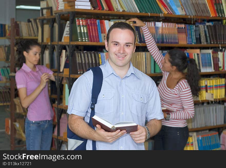 Three Students In Library