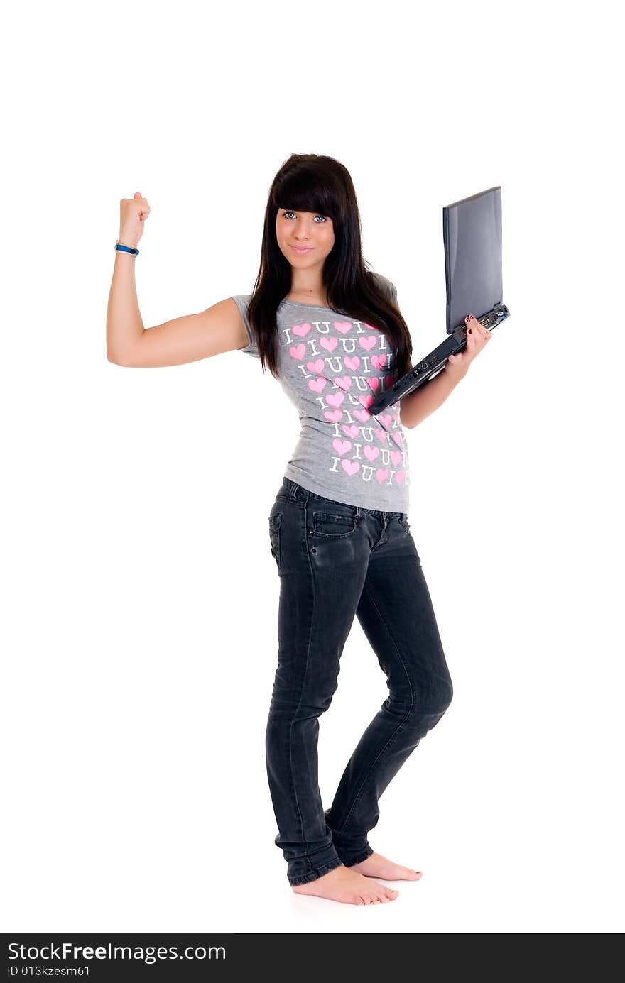 Teenager schoolgirl with laptop on white background