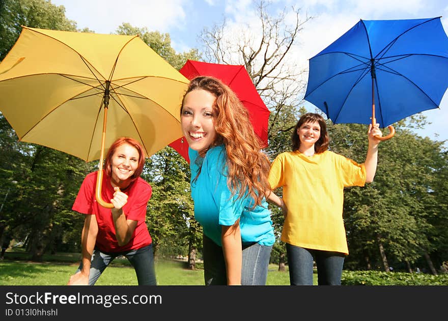 Colorful friends having fun in park. Colorful friends having fun in park