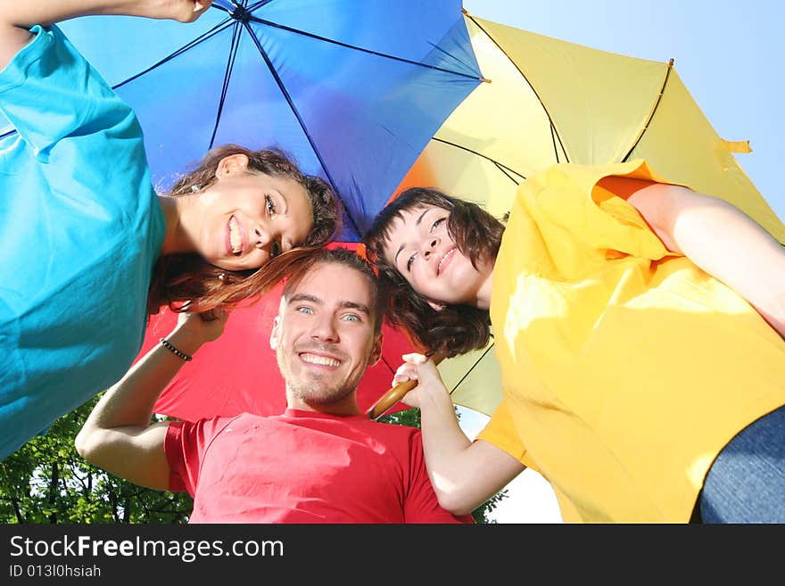 Funny colorful friends with umbrellas. Funny colorful friends with umbrellas