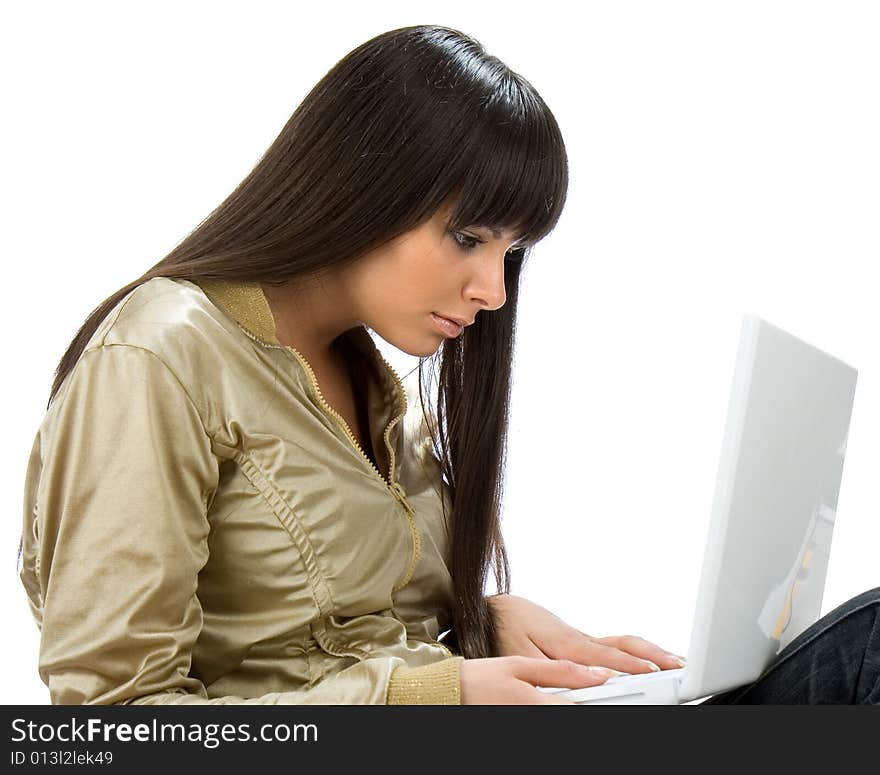 Female Student Sitting With Laptop On Her Lap