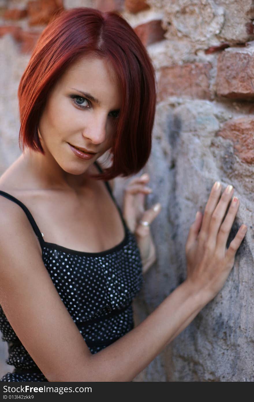 Sexy young girl near old wall. Sexy young girl near old wall