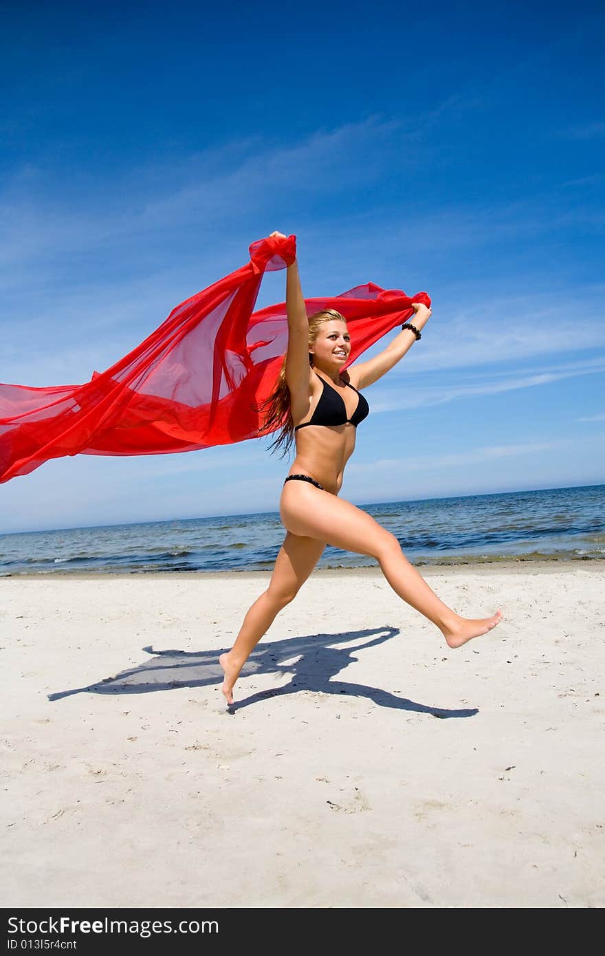 Beautiful girl with red shawl