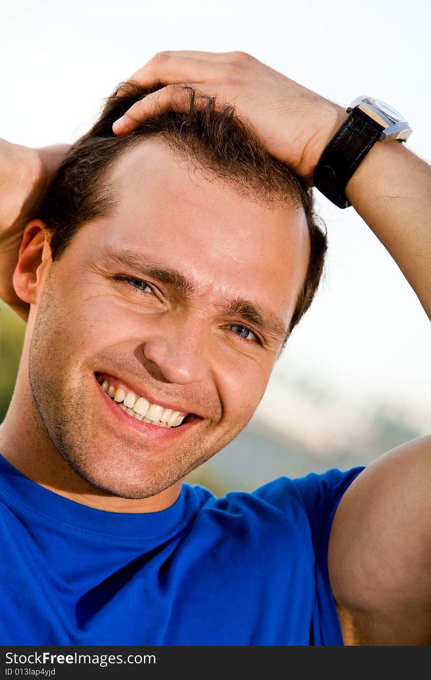 Portrait of smiling caucasian man outdoors. Portrait of smiling caucasian man outdoors