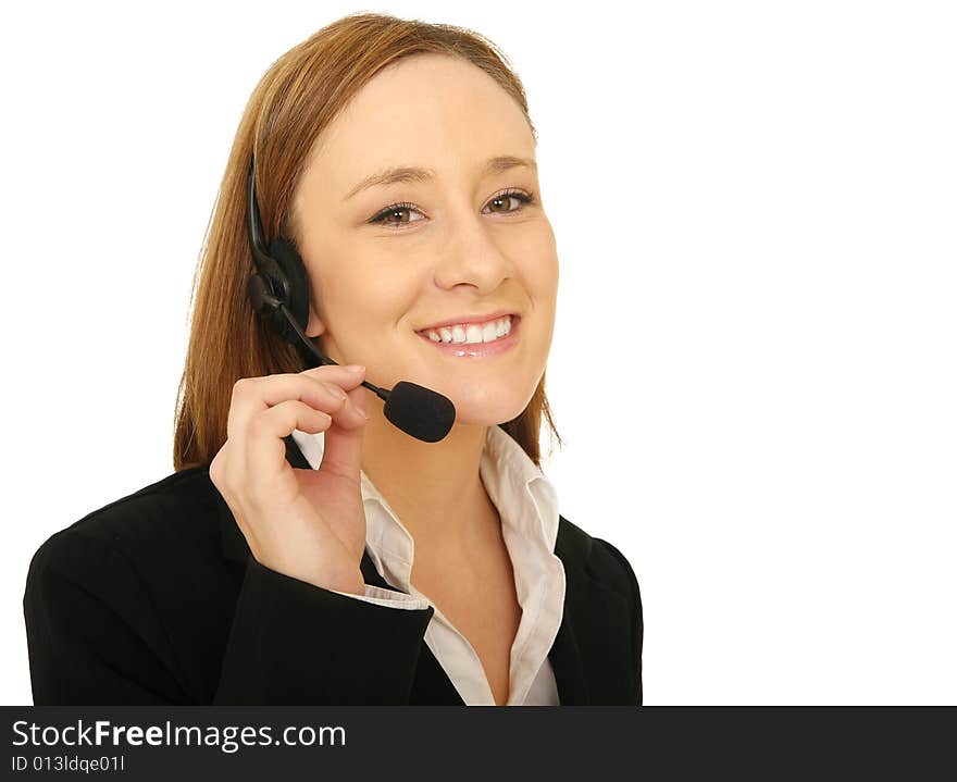 Close up shot of young business woman wearing headset and holding it. Close up shot of young business woman wearing headset and holding it