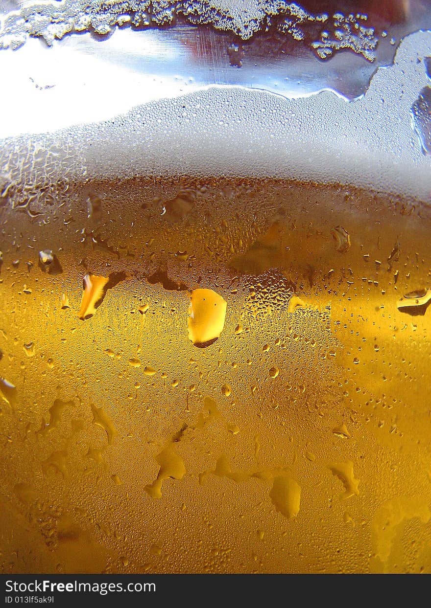 A glass of cold beer. A glass of cold beer