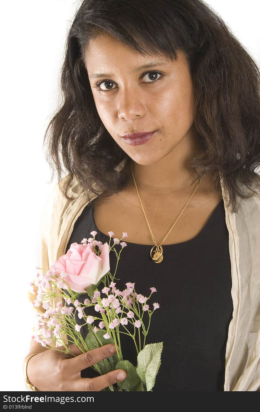 Portrait of a young attractive woman with flowers