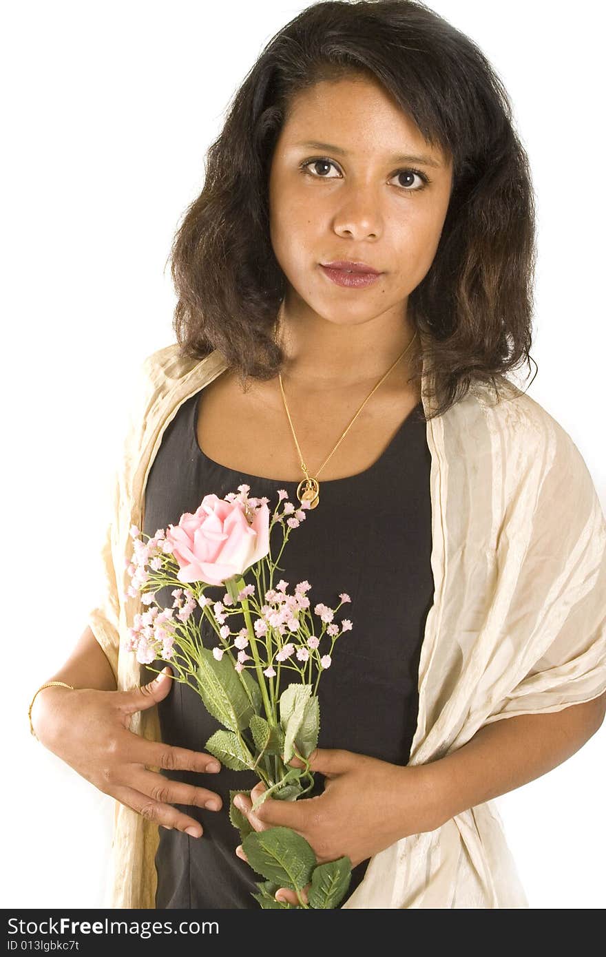 Portrait of a young attractive woman with flowers