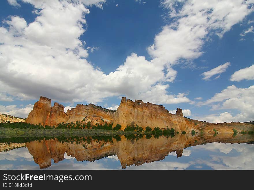 View of the red rock formations in Kodachrome Basin with blue skys and clouds. View of the red rock formations in Kodachrome Basin with blue skys and clouds