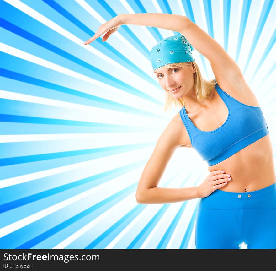 Beautiful young fitness trainer over abstract background