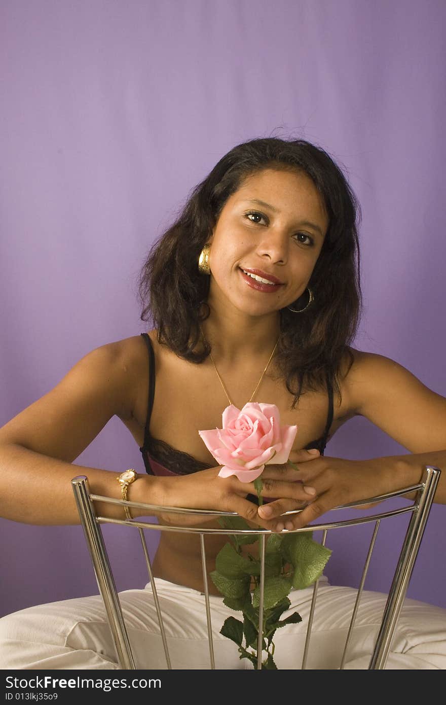 Portrait of a young attractive woman with flowers