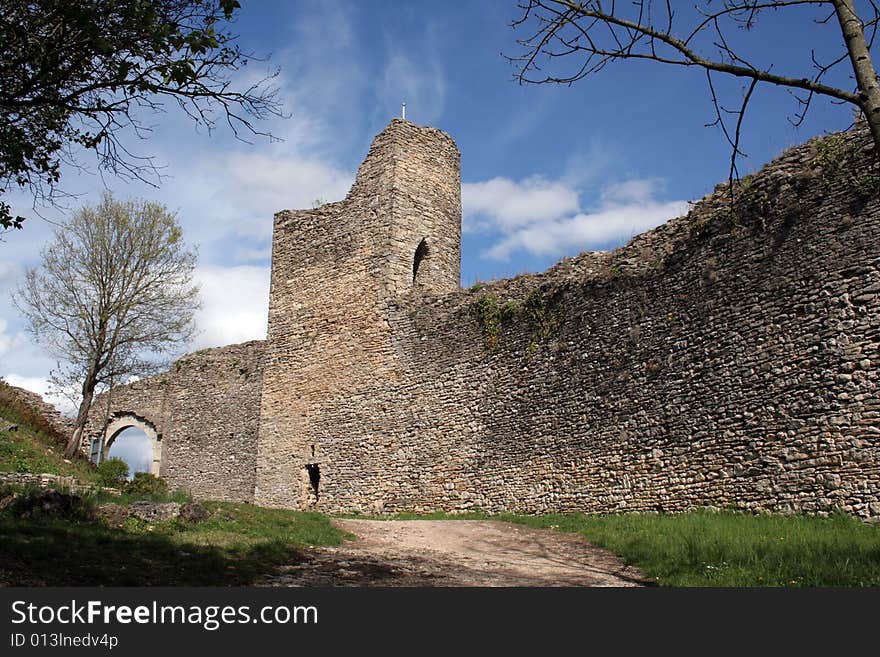 Part of the Saint-Hippolyte medieval ruins, in the town of Cremieu, France. Part of the Saint-Hippolyte medieval ruins, in the town of Cremieu, France.