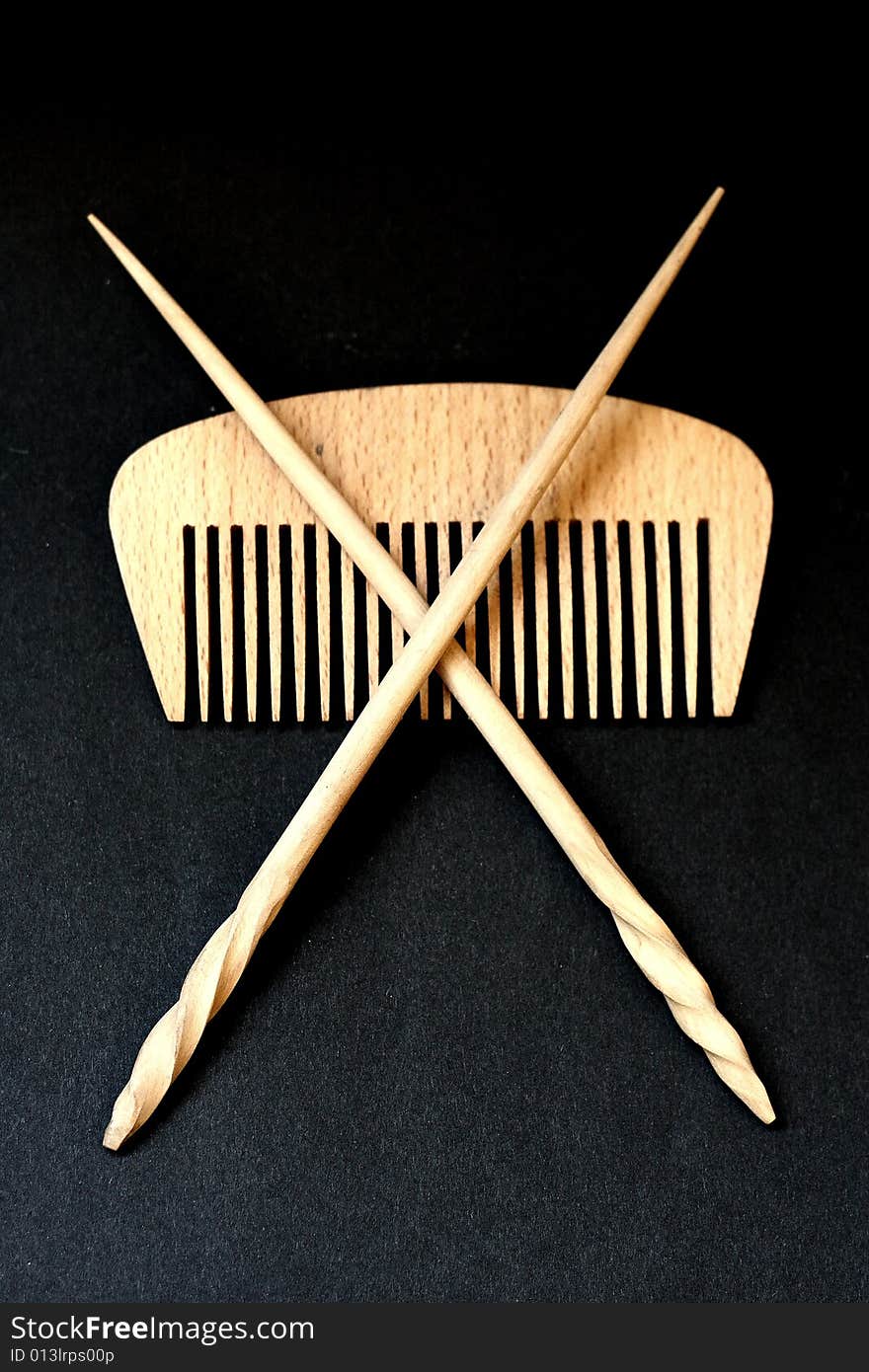 Wooden hairbrush and sticks