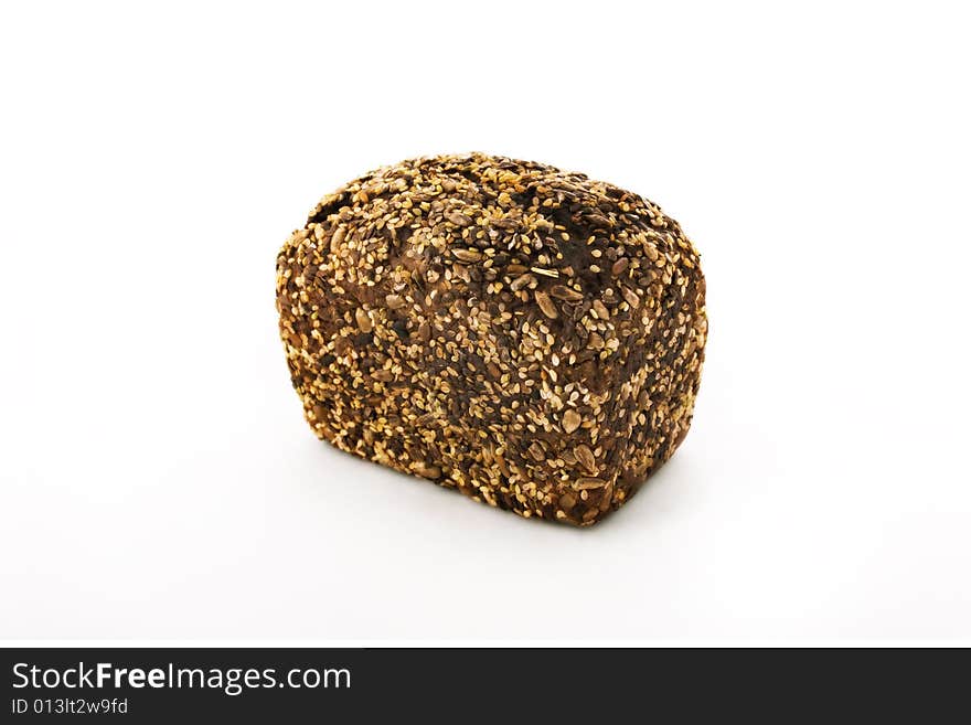 Appetizing brown bread upon white background. Appetizing brown bread upon white background