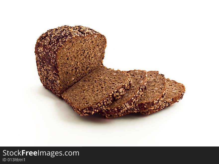 Appetizing brown bread upon white background. Appetizing brown bread upon white background