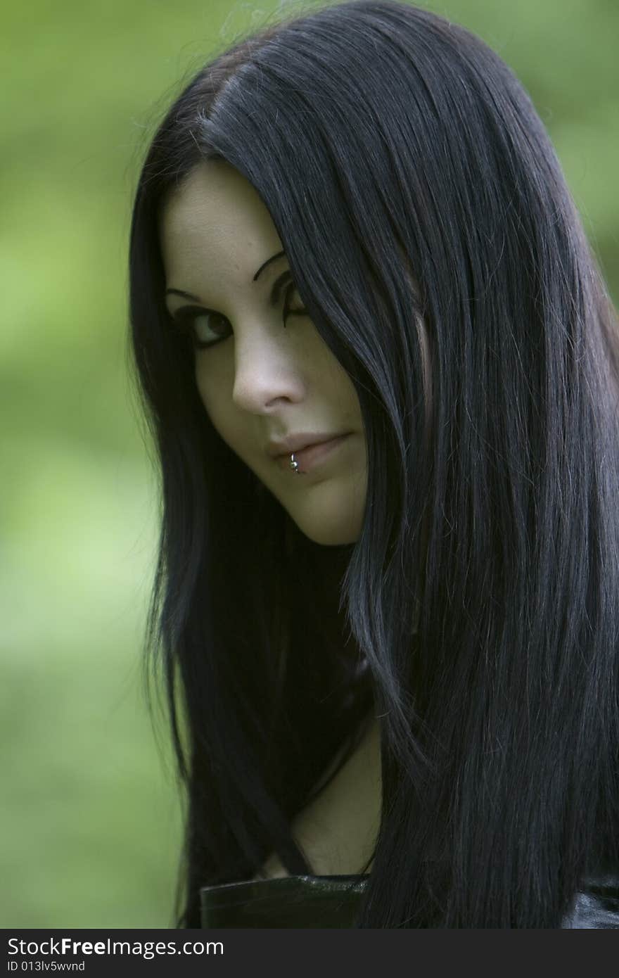 Portrait of a woman with long dark hair