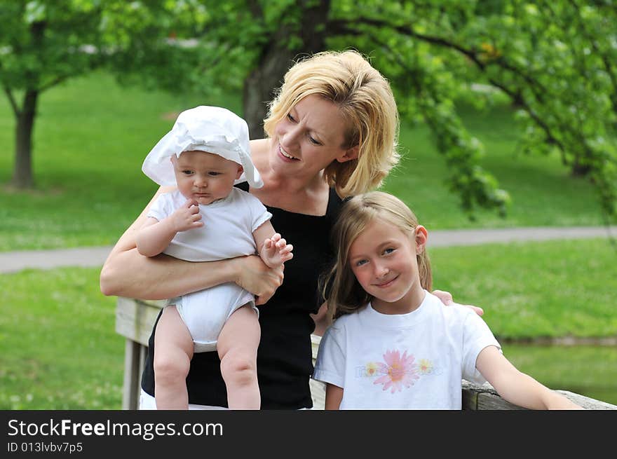 Mother and children outdoors